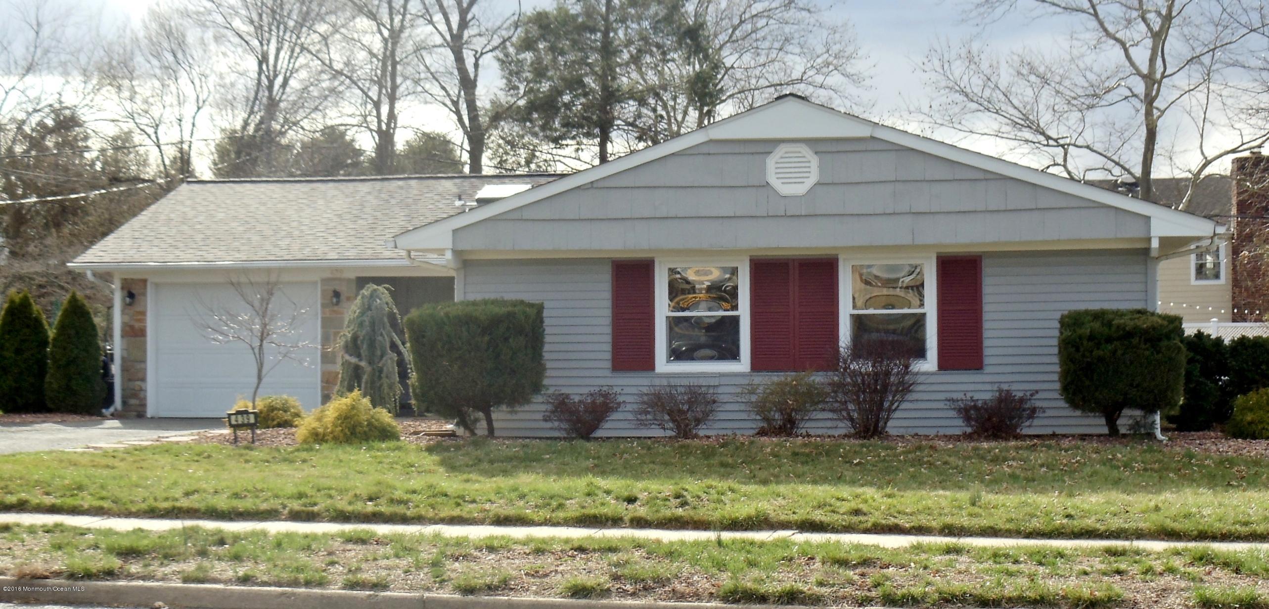 439 Line Road Aberdeen, NJ 07747 - Photo 1 of 22 a front view of a house with garden