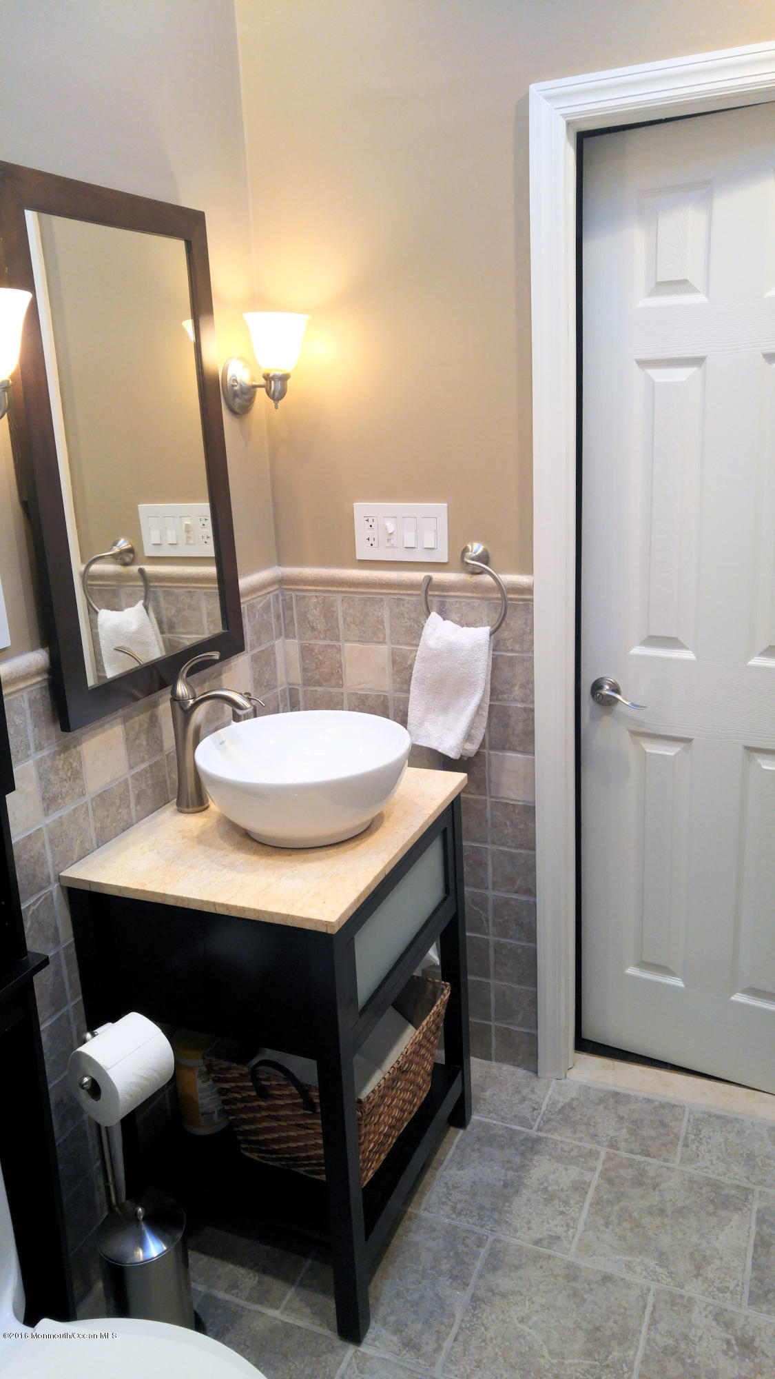 439 Line Road Aberdeen, NJ 07747 - Photo 13 of 22 a bathroom with a sink and a mirror