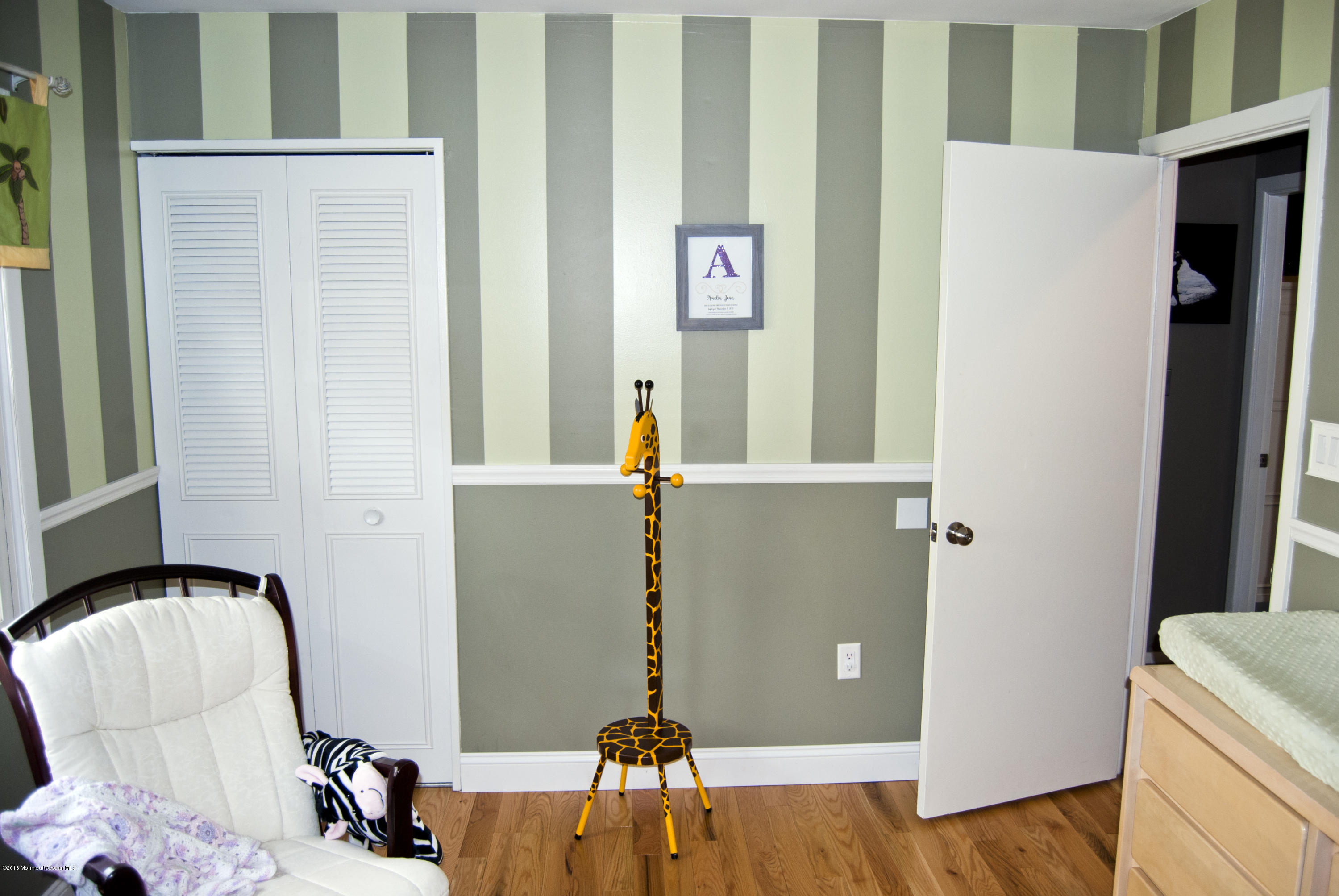 439 Line Road Aberdeen, NJ 07747 - Photo 17 of 22 a bedroom with a bed and a couch