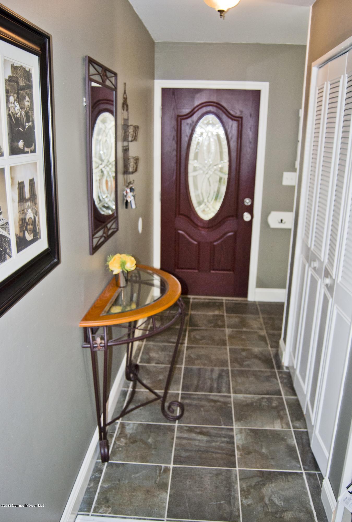 439 Line Road Aberdeen, NJ 07747 - Photo 3 of 22 a view of a hallway with seating area