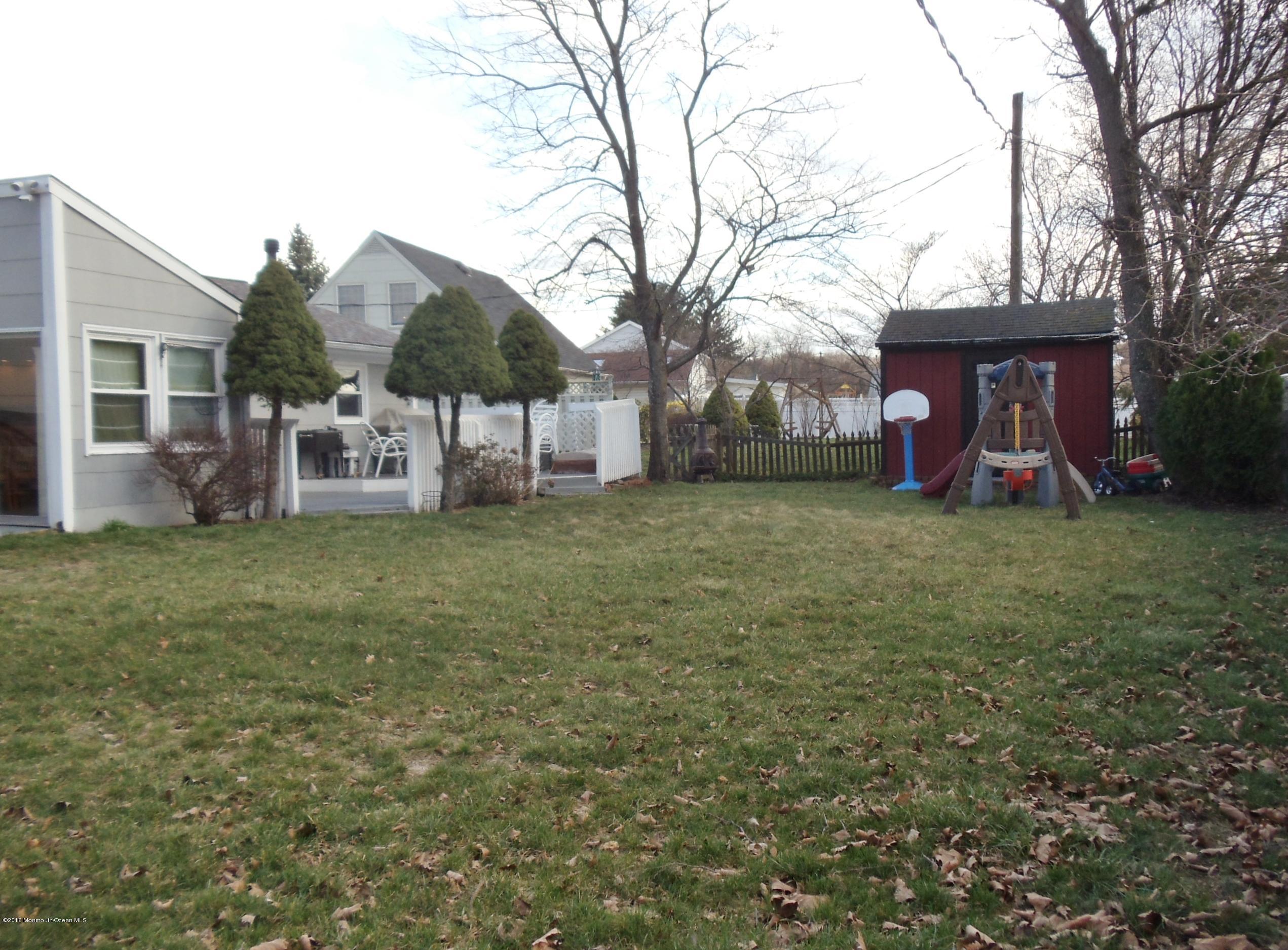 439 Line Road Aberdeen, NJ 07747 - Photo 22 of 22 a view of a house with a yard