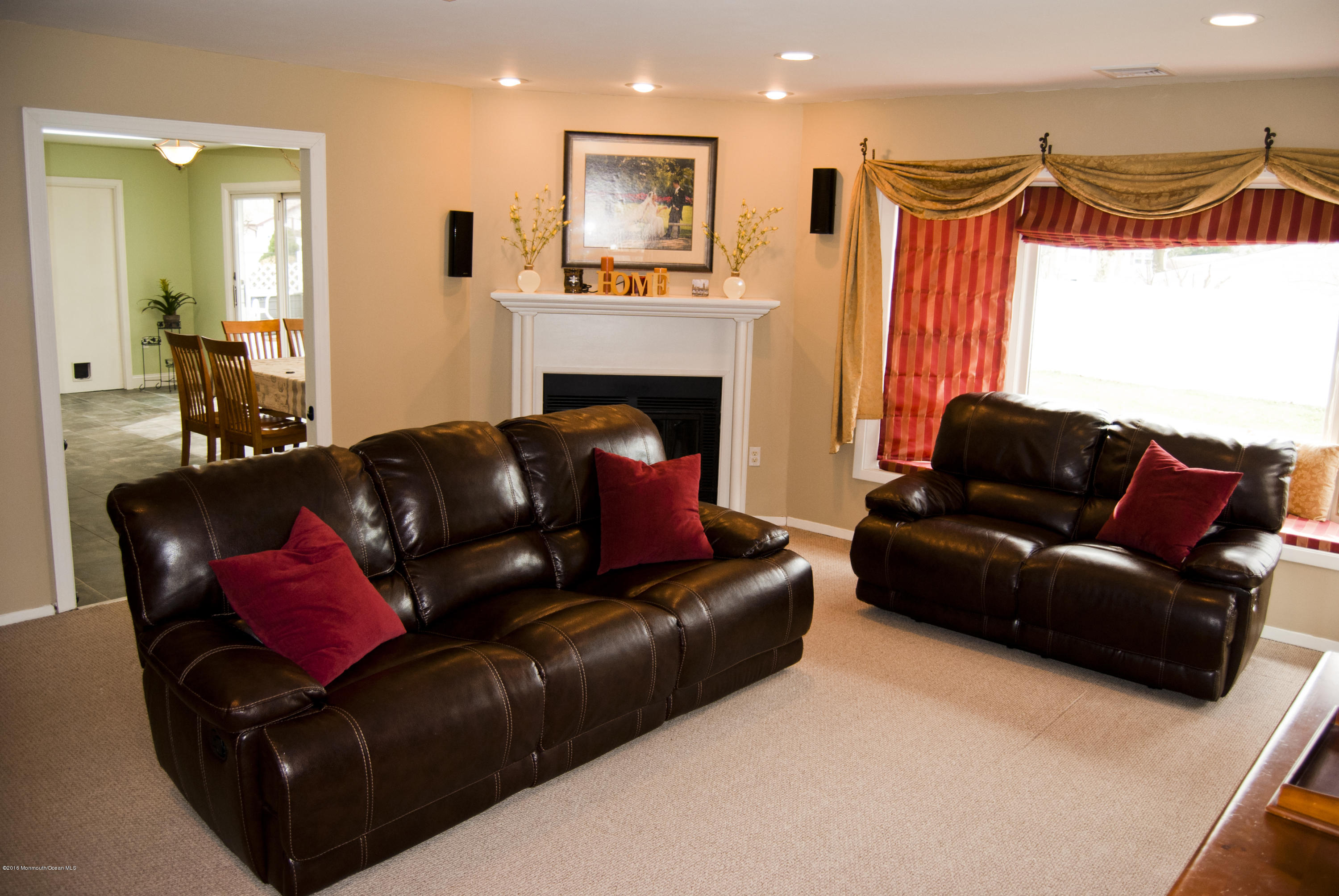 439 Line Road Aberdeen, NJ 07747 - Photo 4 of 22 a living room with furniture and a fireplace