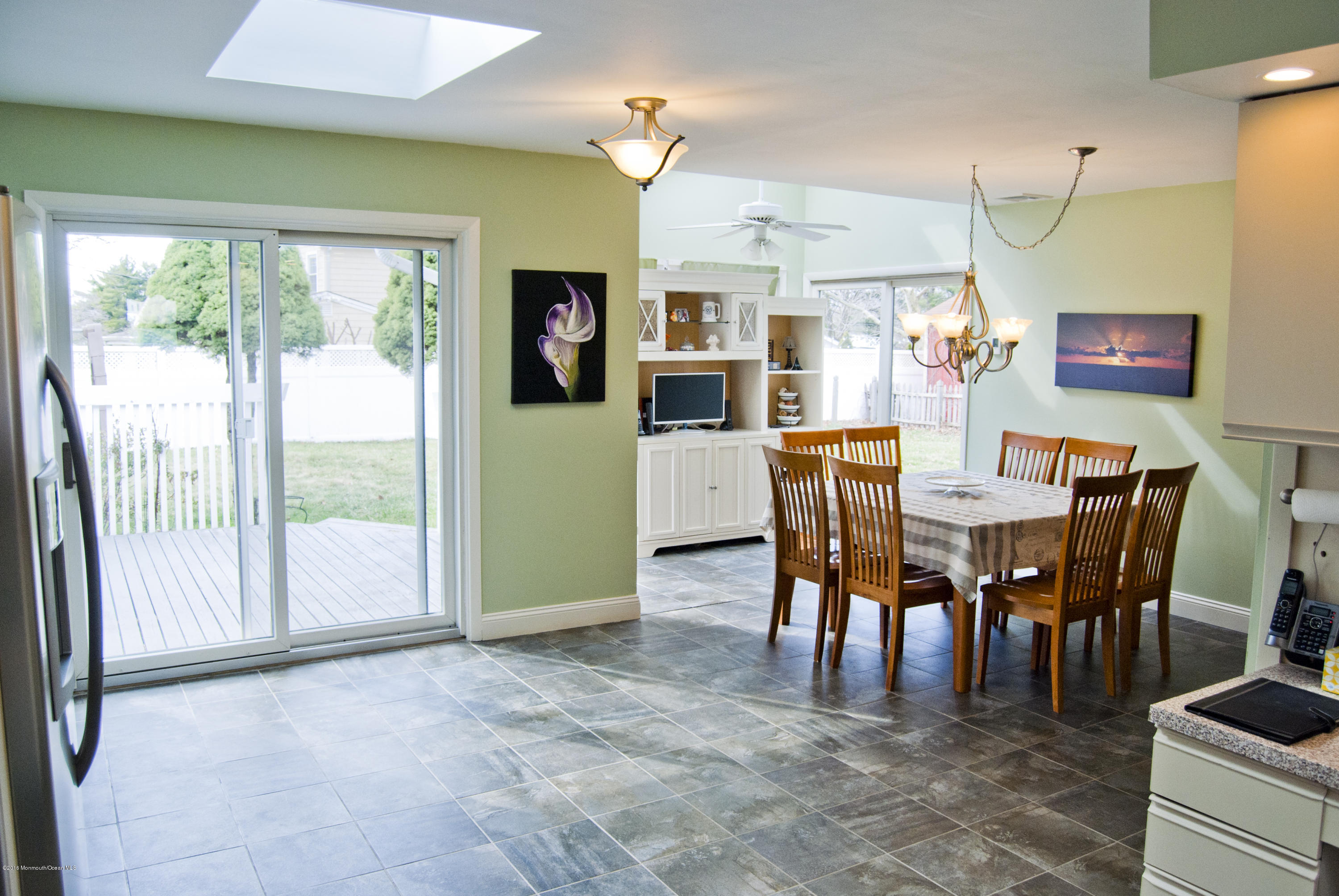 439 Line Road Aberdeen, NJ 07747 - Photo 8 of 22 a view of a dining area with furniture window and outside view