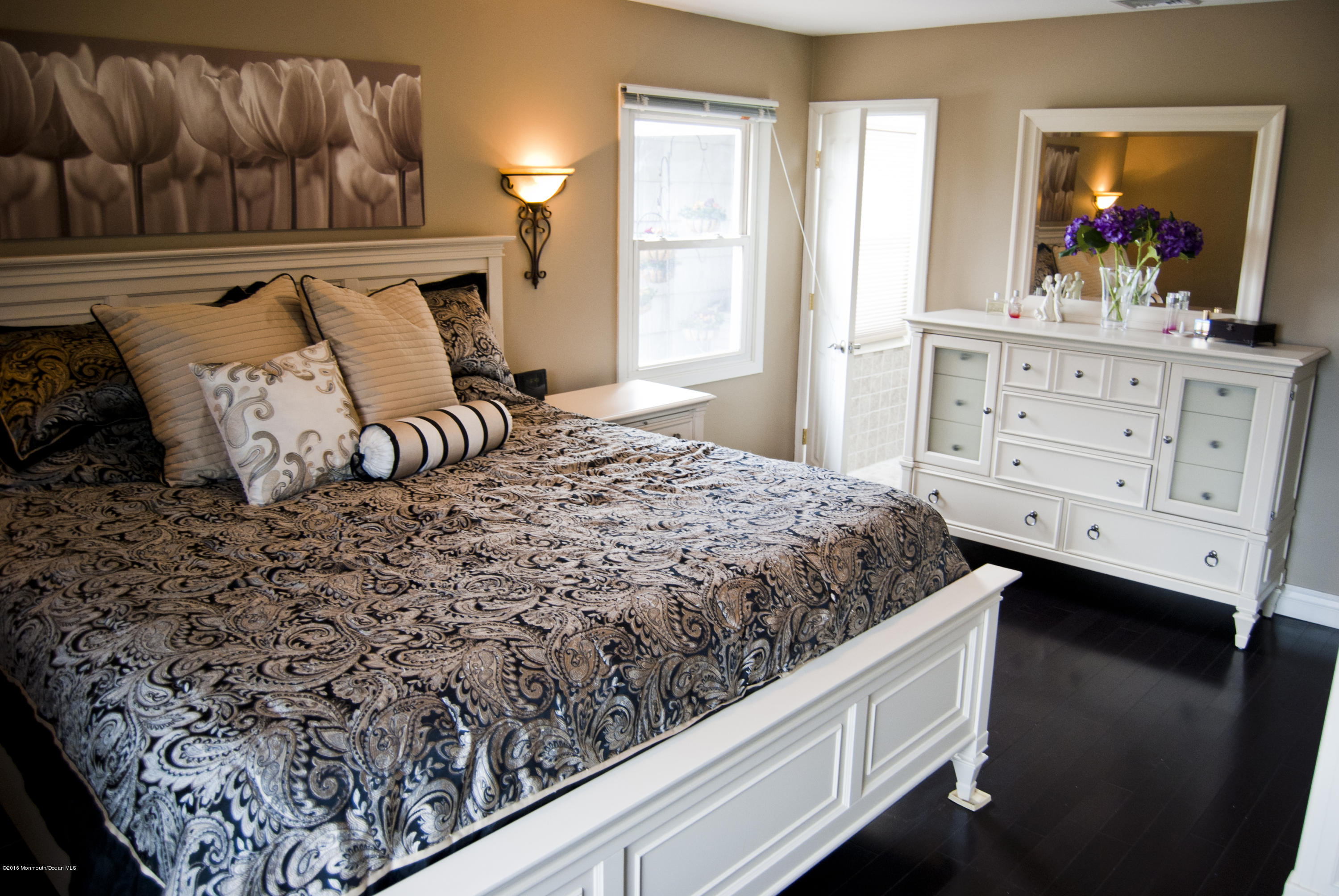 439 Line Road Aberdeen, NJ 07747 - Photo 10 of 22 a bedroom with a bed and a dresser