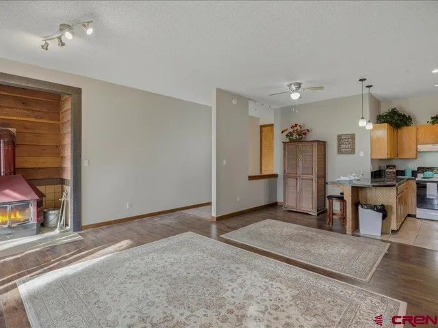 a view of a kitchen with furniture and a kitchen