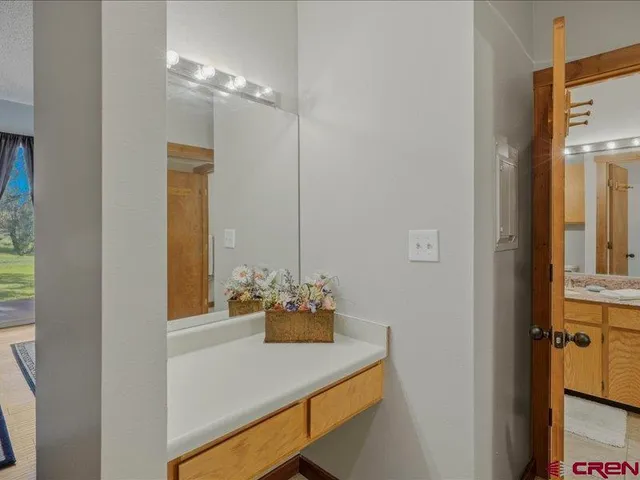 a room with a table and chairs