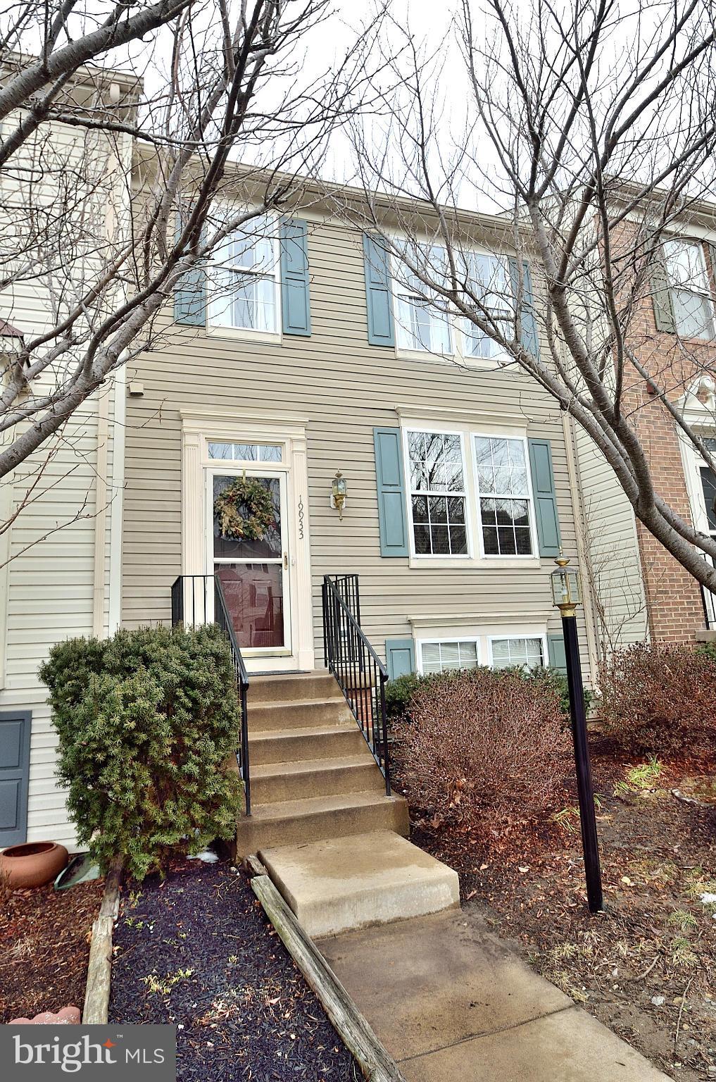 19933 Ridgecrest Square Ashburn, VA 20147 - Photo 1 of 19 a view of a house with a yard