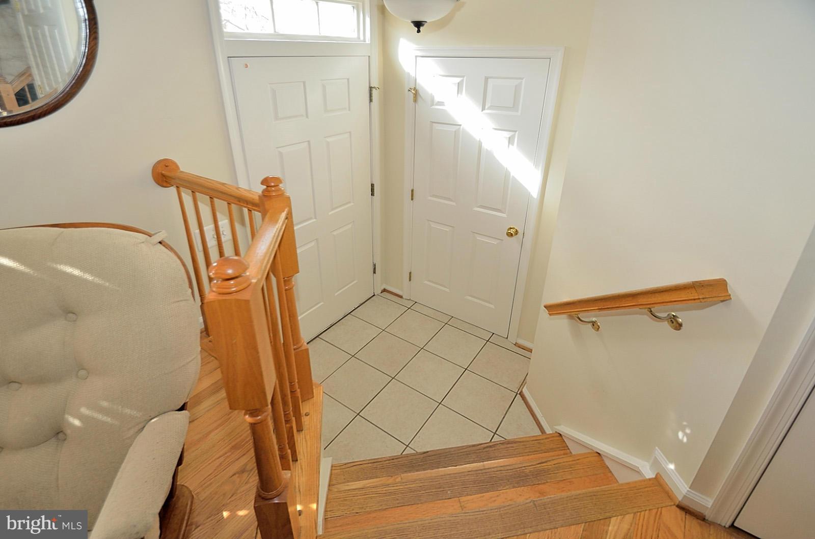 19933 Ridgecrest Square Ashburn, VA 20147 - Photo 2 of 19 a bathroom with a bathtub and shower