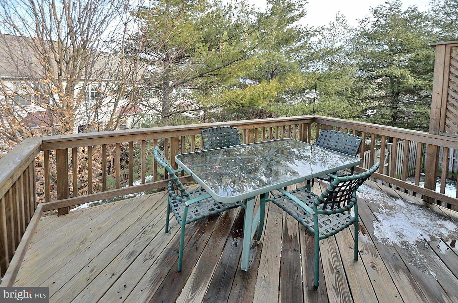19933 Ridgecrest Square Ashburn, VA 20147 - Photo 18 of 19 a view of balcony with furniture and wooden deck