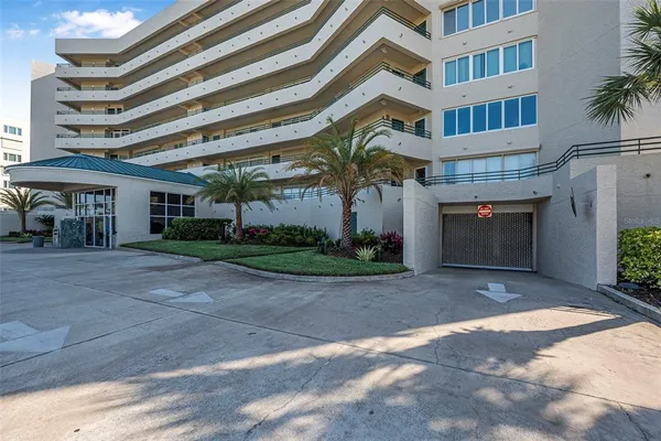 a front view of a building with outdoor space