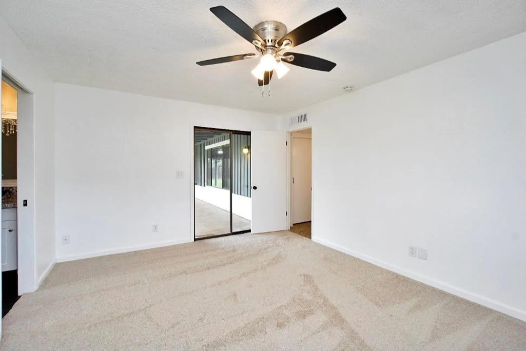 36620 Ave 12 Madera, CA 93636 - Photo 8 of 12 an empty room with fan