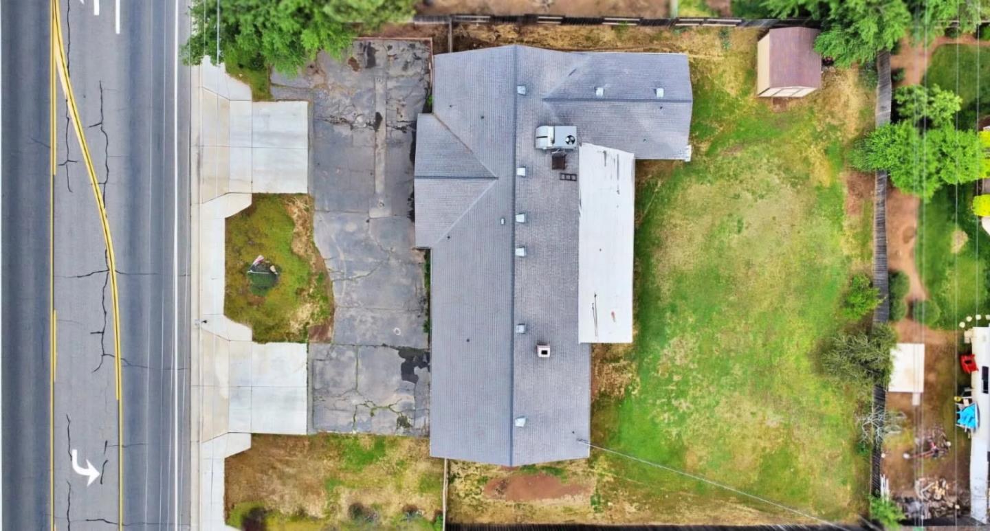 36620 Ave 12 Madera, CA 93636 - Photo 9 of 12 an aerial view of residential houses with outdoor space