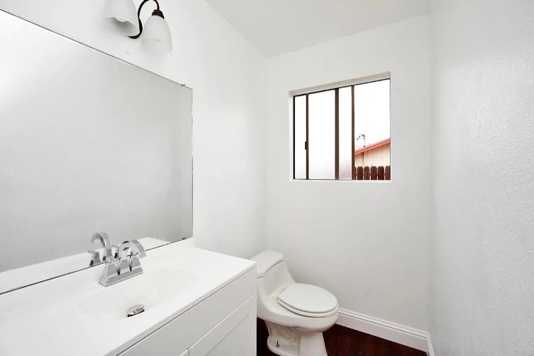 36620 Ave 12 Madera, CA 93636 - Photo 10 of 12 a bathroom with a sink toilet and a mirror