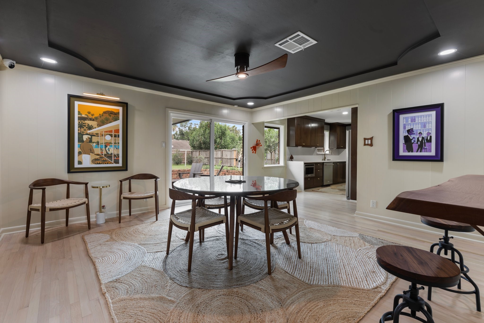 6727 Lindyann Lane Houston, TX 77008 - Photo 24 of 25 a view of a dining room with furniture window and wooden floor
