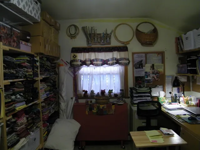 a kitchen with a refrigerator and a stove
