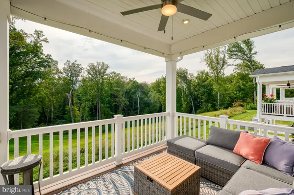a view of a two chairs in the deck
