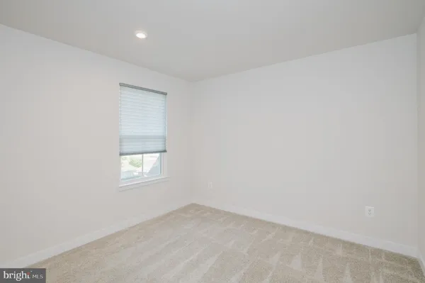 a view of a livingroom with furniture and a livingroom
