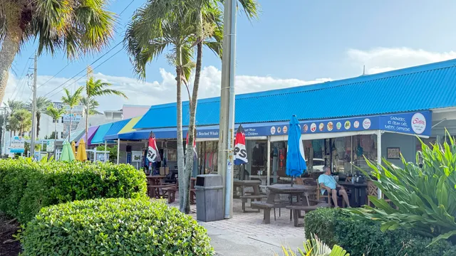 a view of street with sitting area