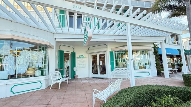 a view of a house with outdoor seating space