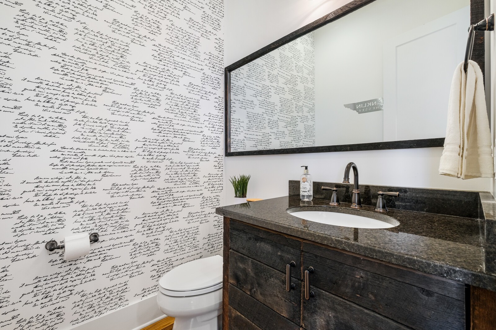 5304 Old Harding Road Franklin, TN 37064 - Photo 28 of 67 a bathroom with a granite countertop toilet sink and mirror