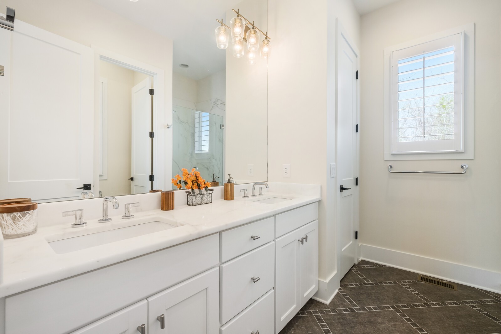 5304 Old Harding Road Franklin, TN 37064 - Photo 33 of 67 a bathroom with a double vanity sink and a mirror