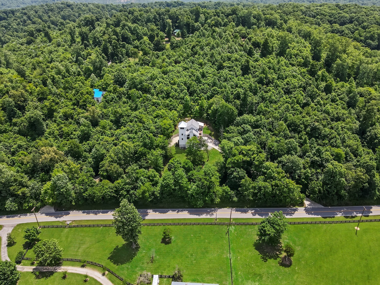 5304 Old Harding Road Franklin, TN 37064 - Photo 66 of 67 an aerial view of a golf course with a lake view