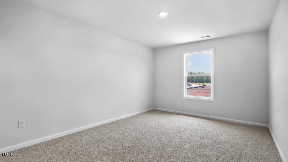 2218 Redpoll Drive Apex, NC 27539 - Photo 23 of 33 Bedroom