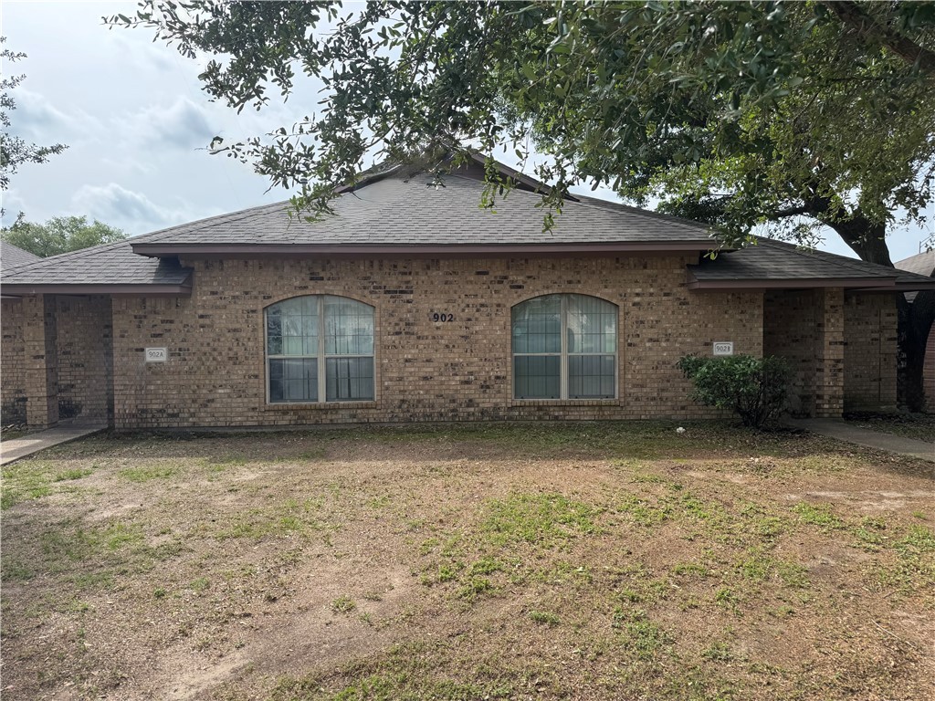 902 Azalea Court College Station, TX 77840 - Photo 1 of 10 View of home's exterior featuring roof with shingl
