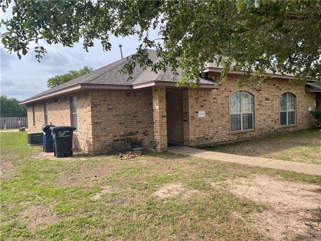 902 Azalea Court College Station, TX 77840 - Photo 8 of 10 View of front of house with brick siding, a front