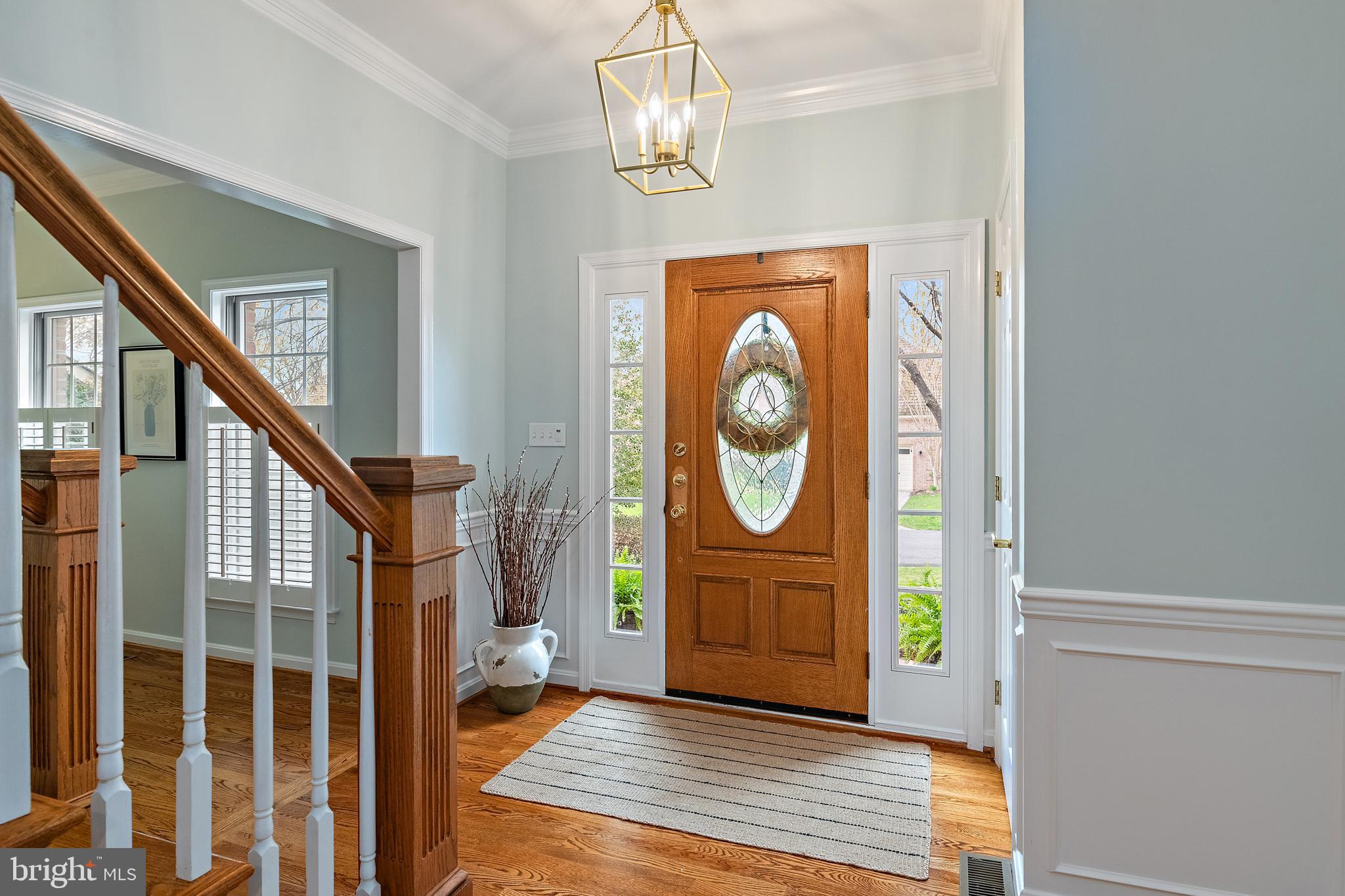 150 South River Landing Road Edgewater, MD 21037 - Photo 6 of 50 a view of a hallway with wooden floor and staircase