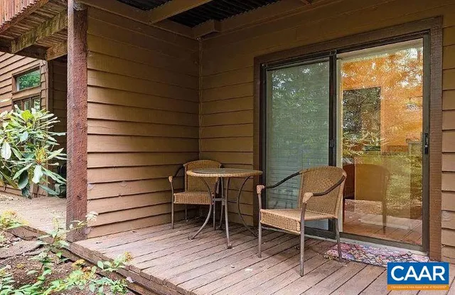 a view of a outdoor seating area with furniture