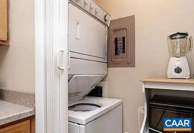 a utility room with dryer and washer