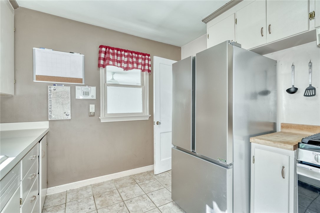 606 Bay Road Webster, NY 14580 - Photo 15 of 49 Bright neutral kitchen with sink overlooking the b