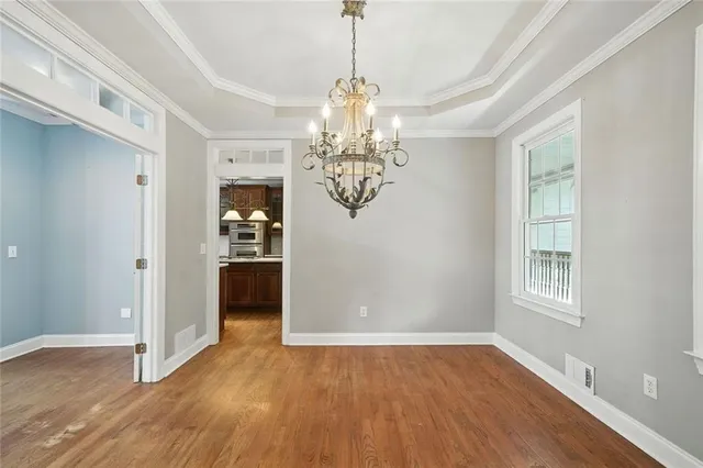 a view of bathroom with bathtub and window