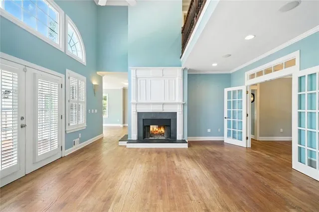 a white toilet sitting next to a bath tub
