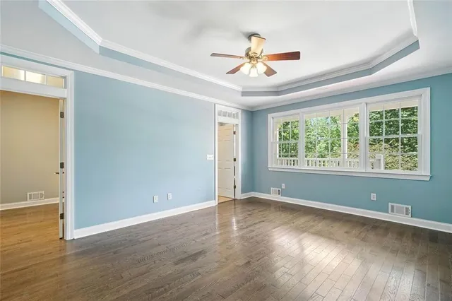 a view of a house with swimming pool and sitting area