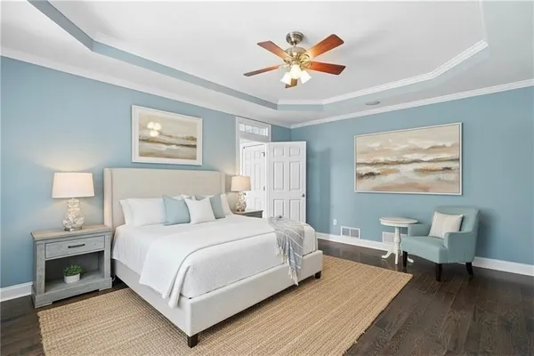 a view of a house with swimming pool and sitting area