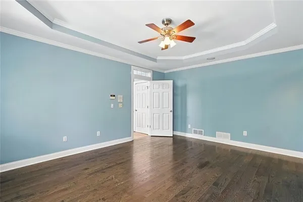 a view of a swimming pool with a yard