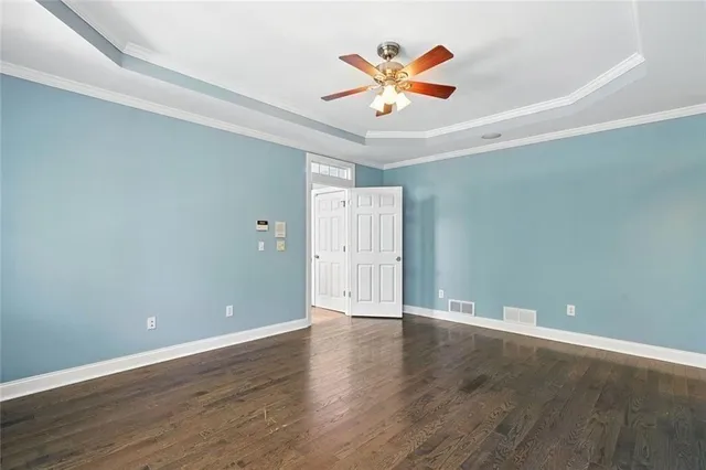 a view of a swimming pool with a yard