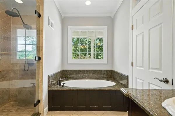 a view of backyard with a deck