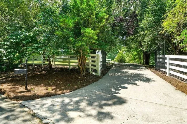 a view of a house with a swimming pool