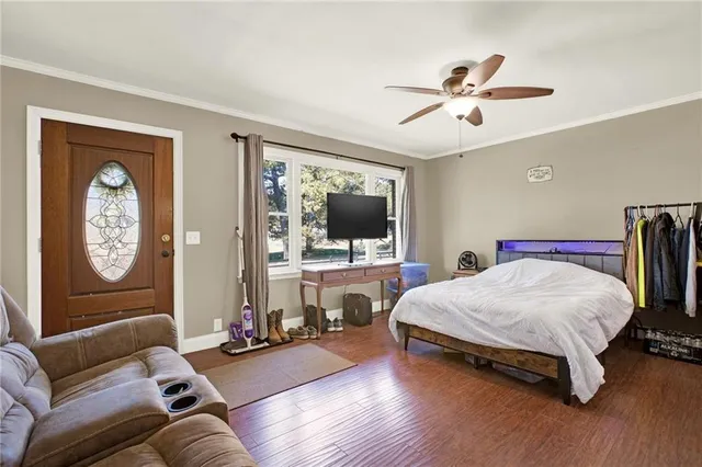 a kitchen with granite countertop wooden cabinets stainless steel appliances and a window