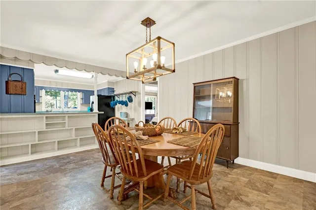 a living room with furniture fireplace and flat screen tv