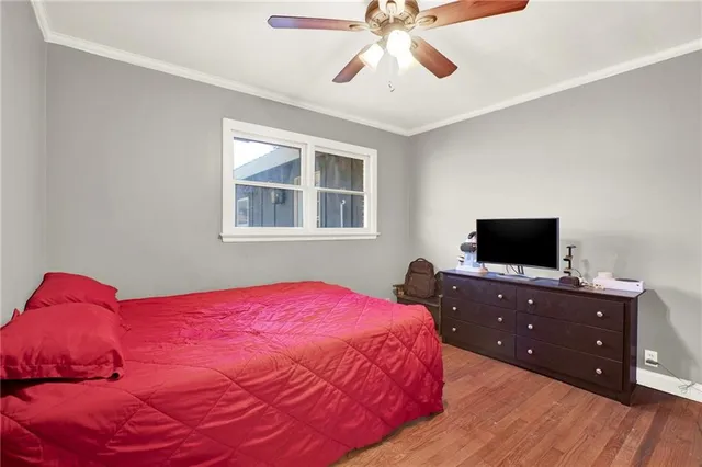 a bedroom with a bed and a closet