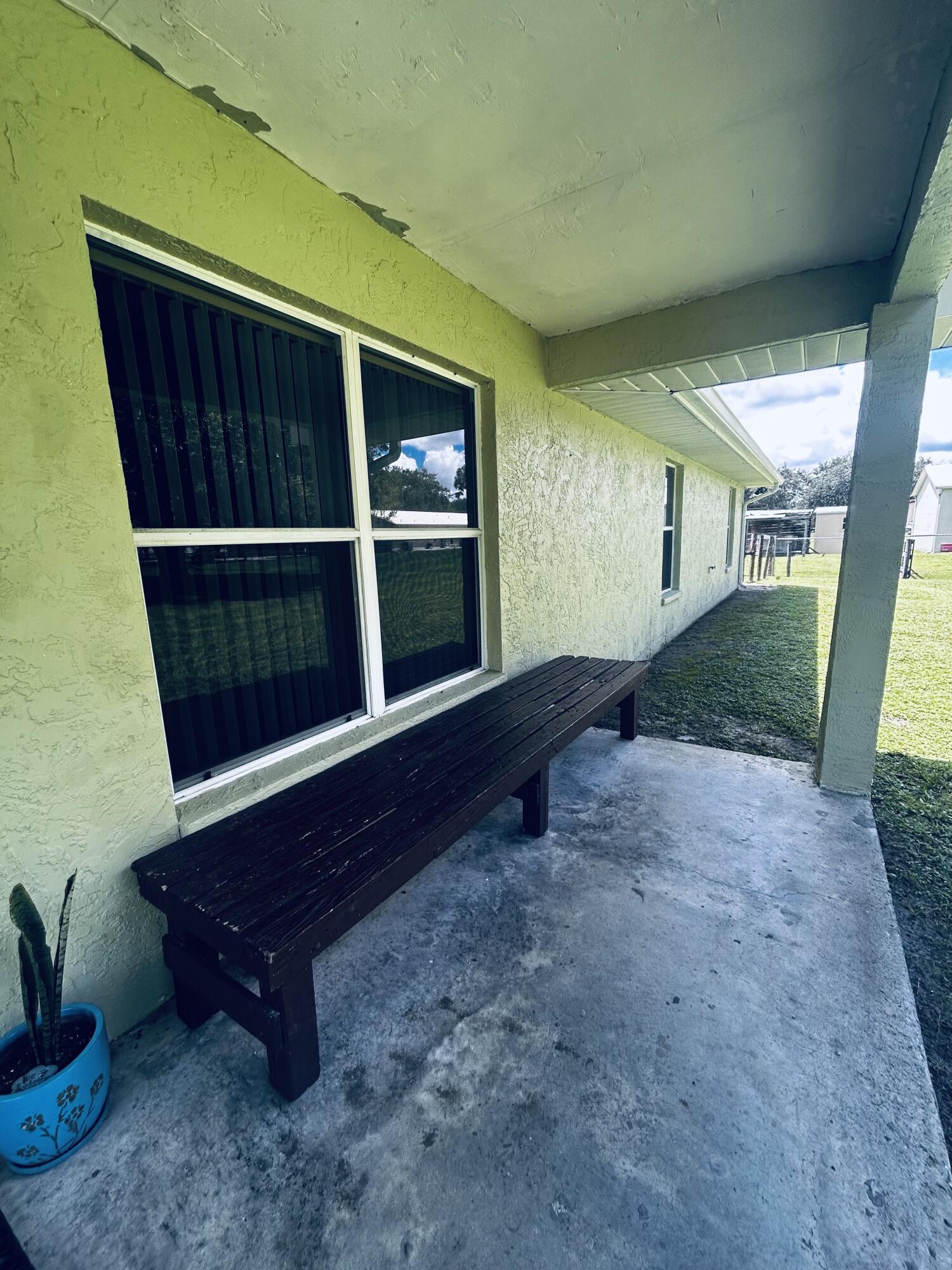 340 Pine Lane Clewiston, FL 33440 - Photo 34 of 46 a view of backyard with door