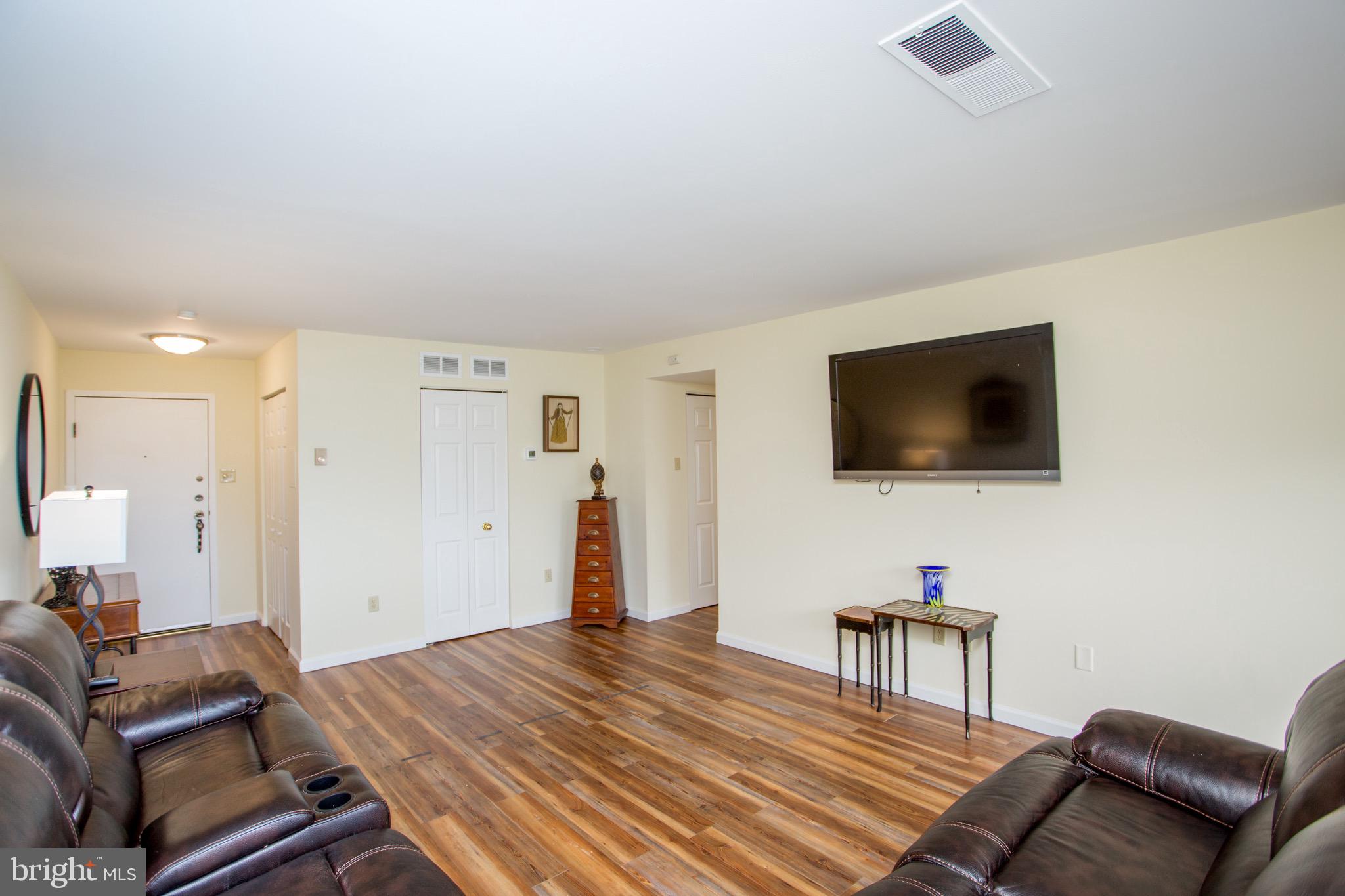1680 Huntingdon Pike, Unit CONDO 224 Huntingdon Valley, PA 19006 - Photo 18 of 50 a living room with furniture and a flat screen tv