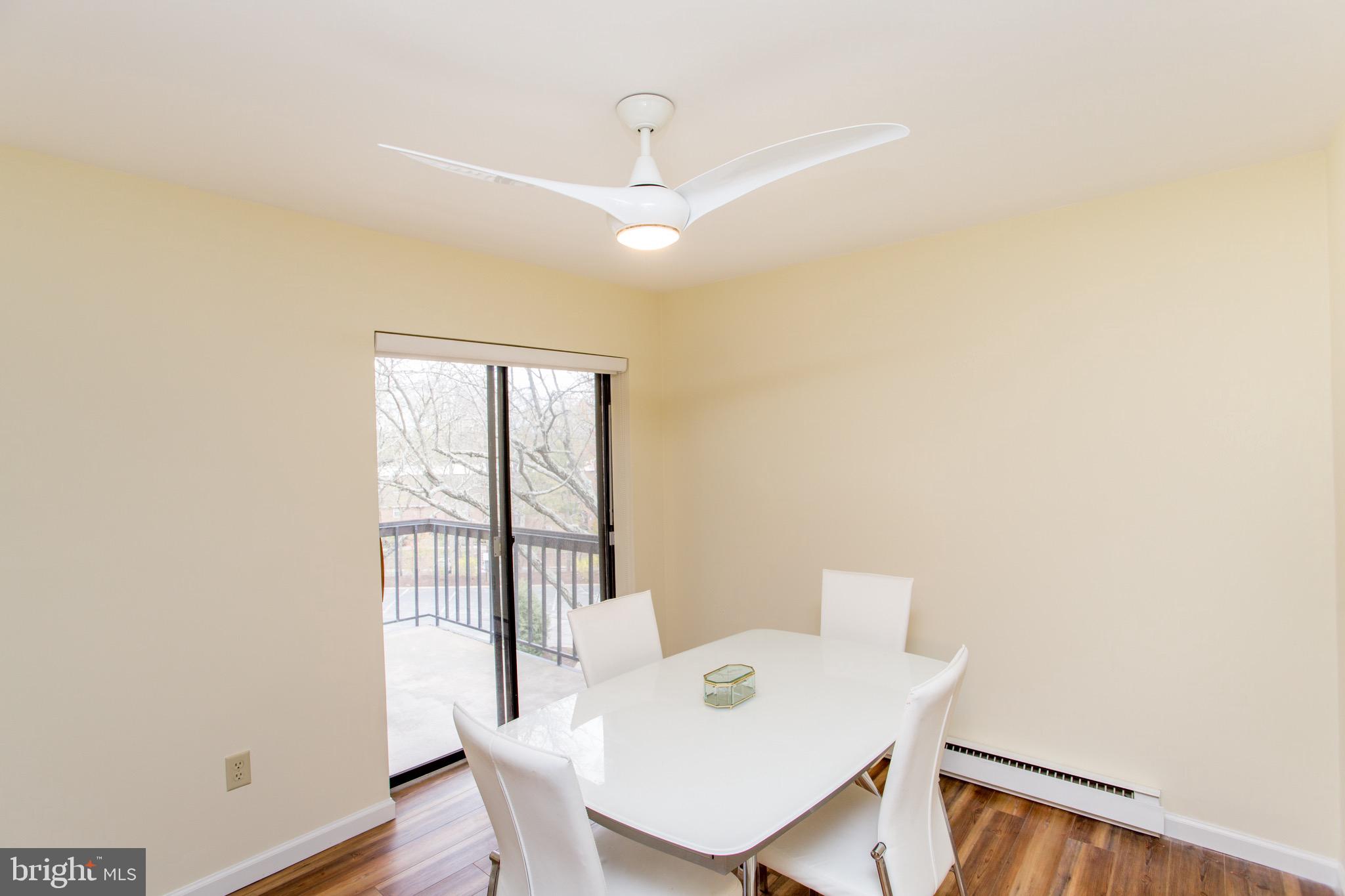 1680 Huntingdon Pike, Unit CONDO 224 Huntingdon Valley, PA 19006 - Photo 21 of 50 a view of a dining room with furniture and wooden floor