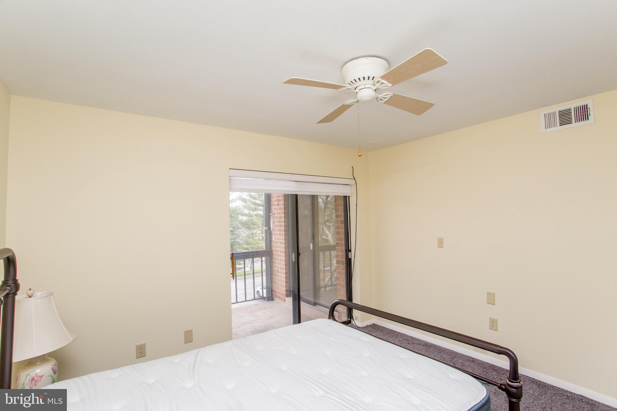 1680 Huntingdon Pike, Unit CONDO 224 Huntingdon Valley, PA 19006 - Photo 37 of 50 a bedroom with a bed and a window