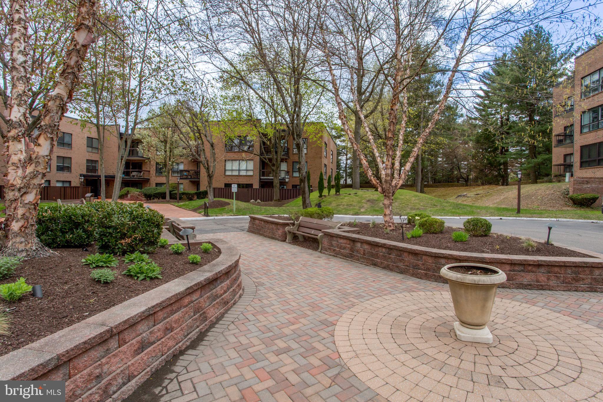 1680 Huntingdon Pike, Unit CONDO 224 Huntingdon Valley, PA 19006 - Photo 5 of 50 a view of a yard with potted plants