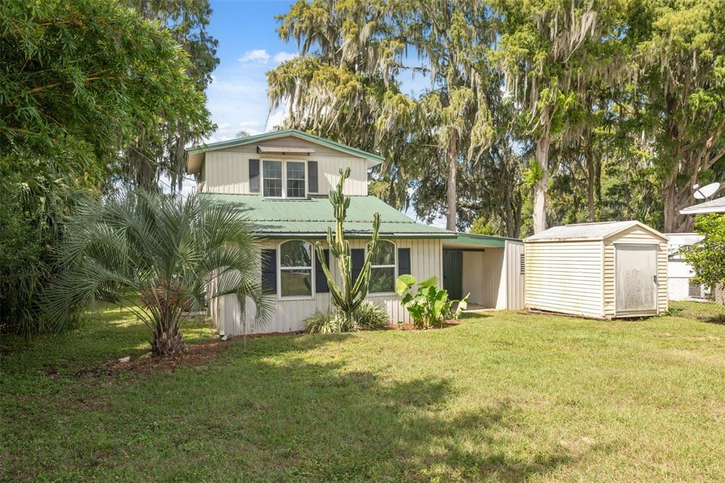 7965 West Riverbend Road Crystal River, FL 34428 - Photo 17 of 60 front view of house with a yard